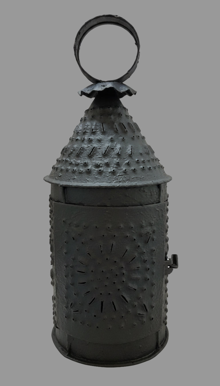 A textured black metal lantern designed for a tealight candle holder.