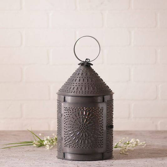 A 15-inch kettle black metal fireside lantern with a punch pattern design, featuring a glass door and a top handle for hanging.