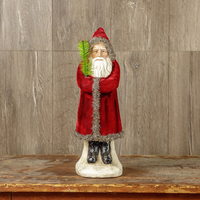 A 16-inch deep red velvet belsnickle figurine with a Santa Claus design, standing on a flat surface.