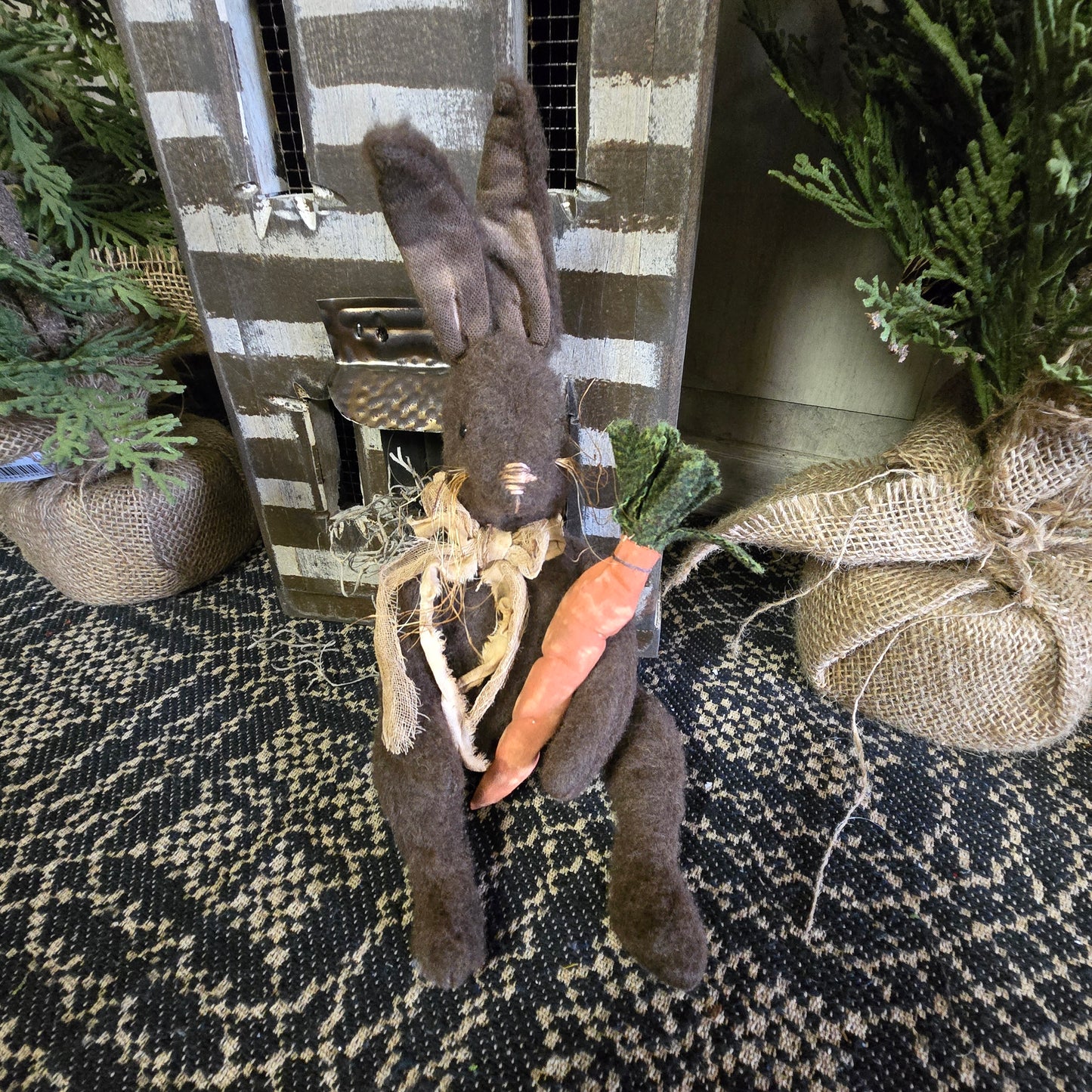 Primitive Brown Bunny Holding Carrot
