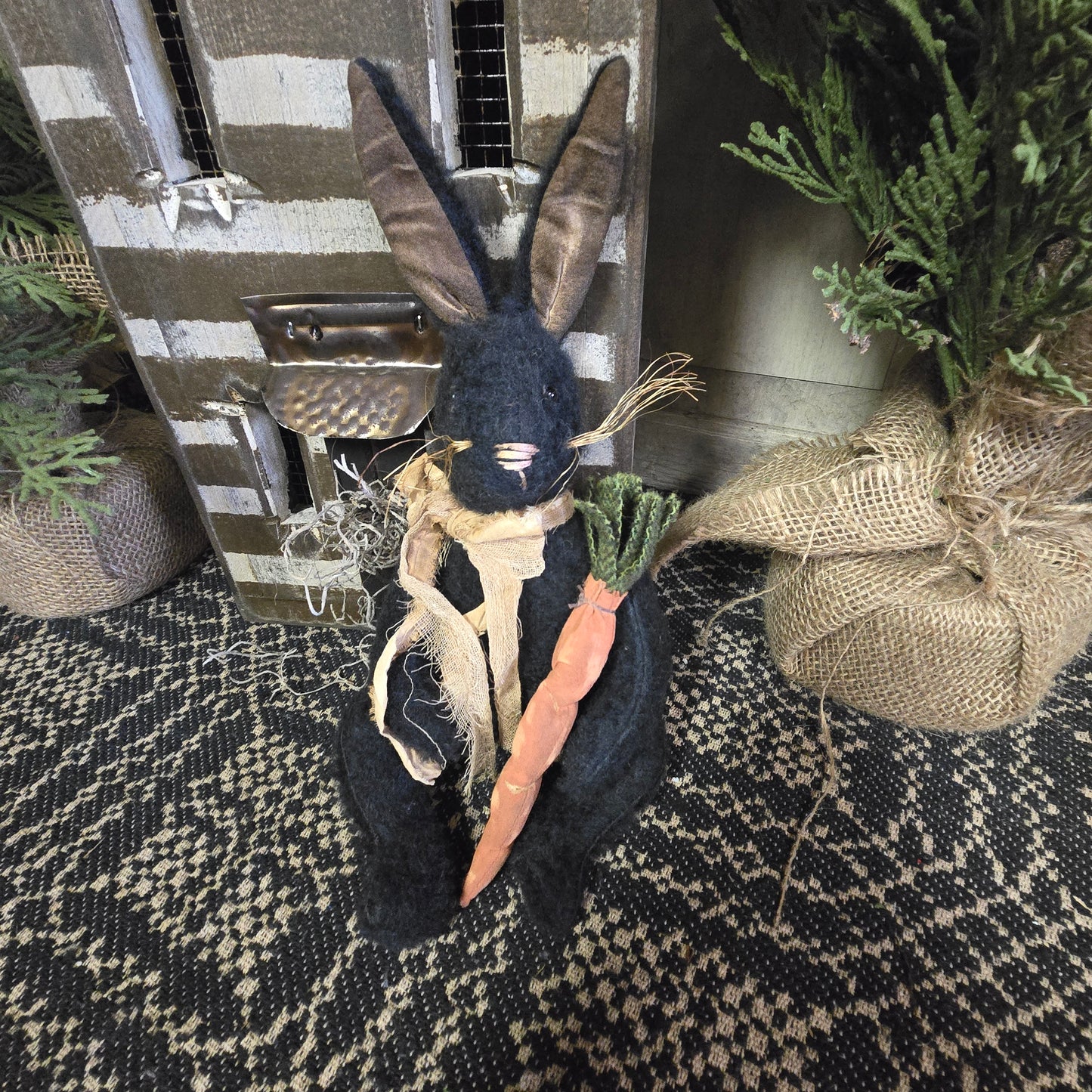 Primitive Black Bunny Holding Carrot
