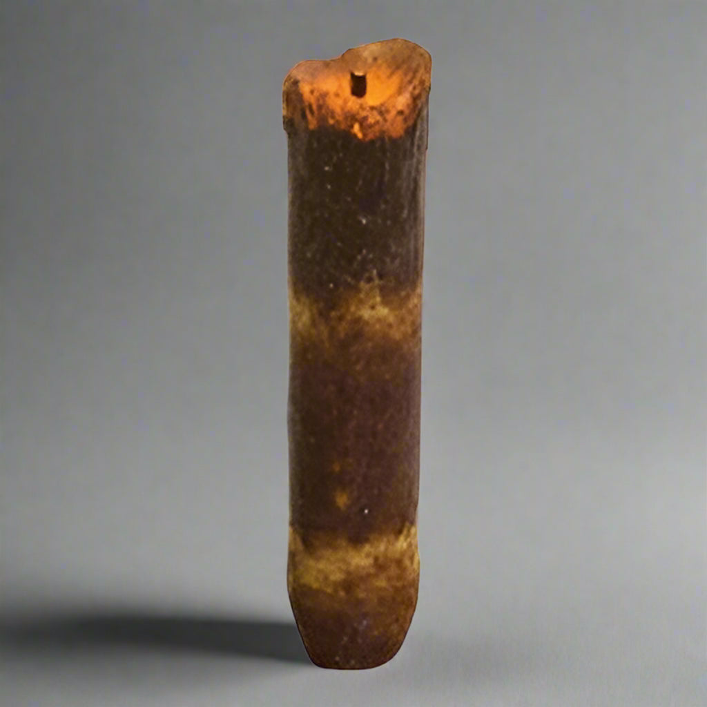 Burnt ivory timer taper on gray background