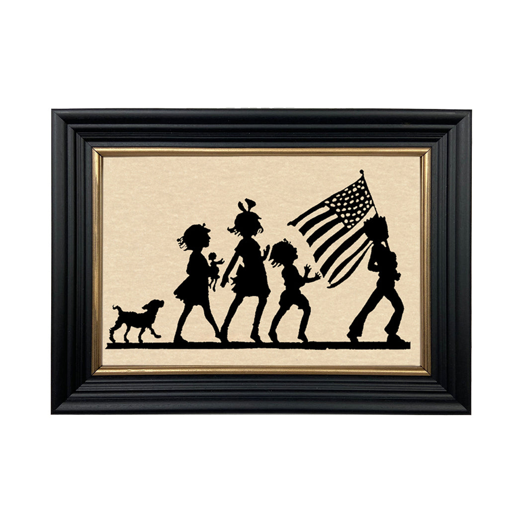 Fourth of July parade silhouette in black frame