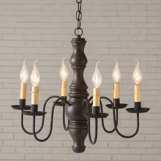 A sophisticated, textured black over red finished Gettysburg wooden chandelier with six E12/Candelabra sockets, featuring handcrafted details such as crimped pans and textured arms, suspended from a chain.