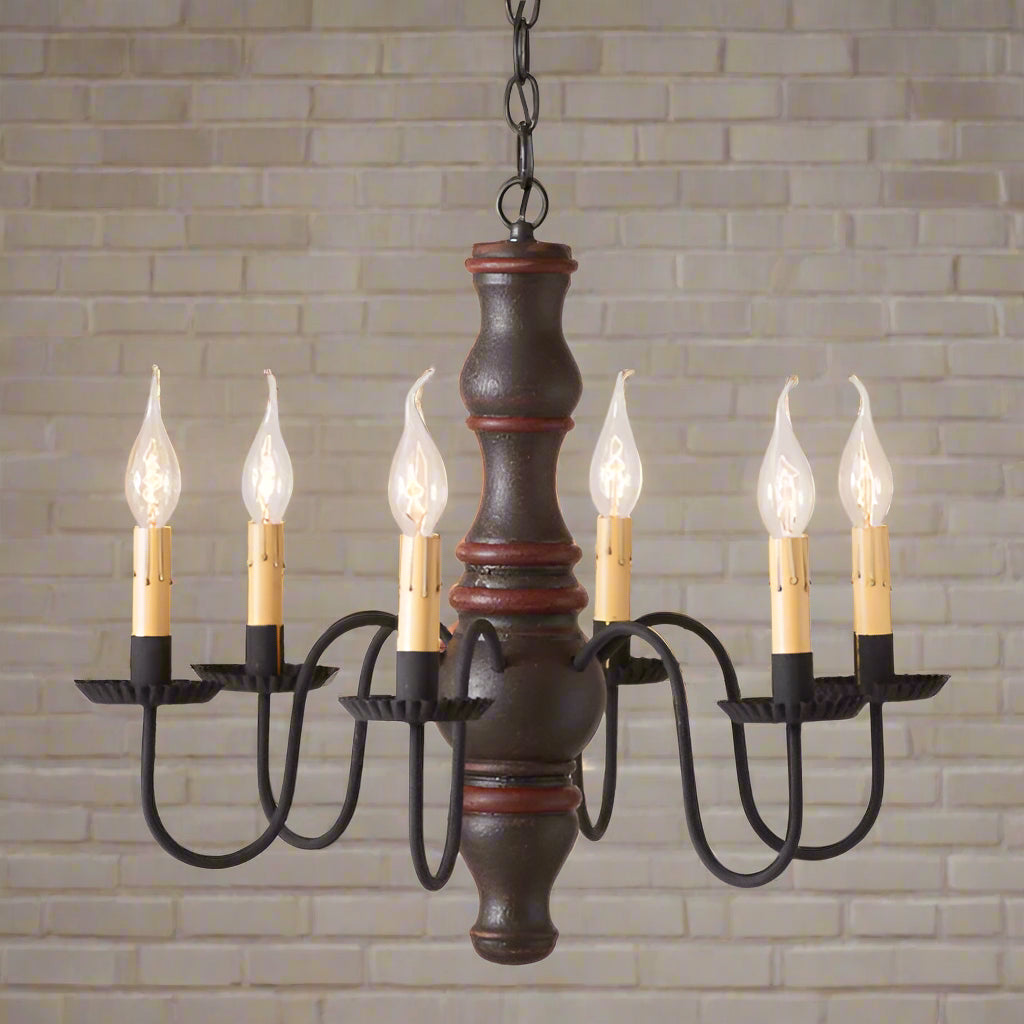 A Gettysburg wooden chandelier with a textured black finish over a red stripe, featuring six E12/Candelabra sockets, black textured arms, and a ceiling plate.
