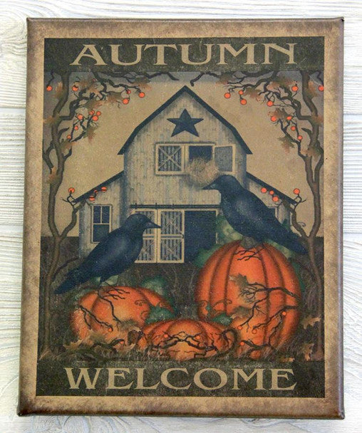 A canvas print featuring a rural autumn-themed scene with a house, pumpkins, crows, and the text 'Autumn' and 'Welcome'.