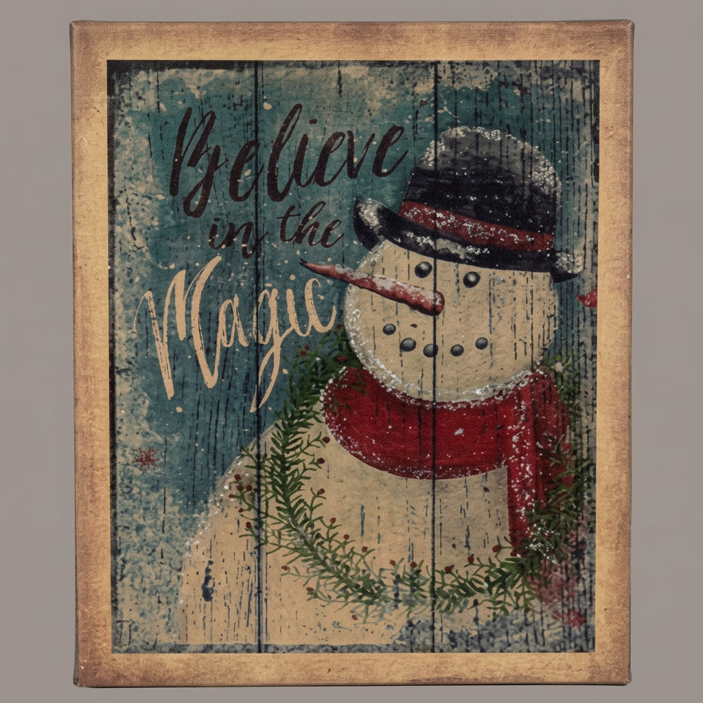 A canvas print featuring a snowman with the phrase 'Believe in Magic' in bold letters, set against a rustic wooden background.