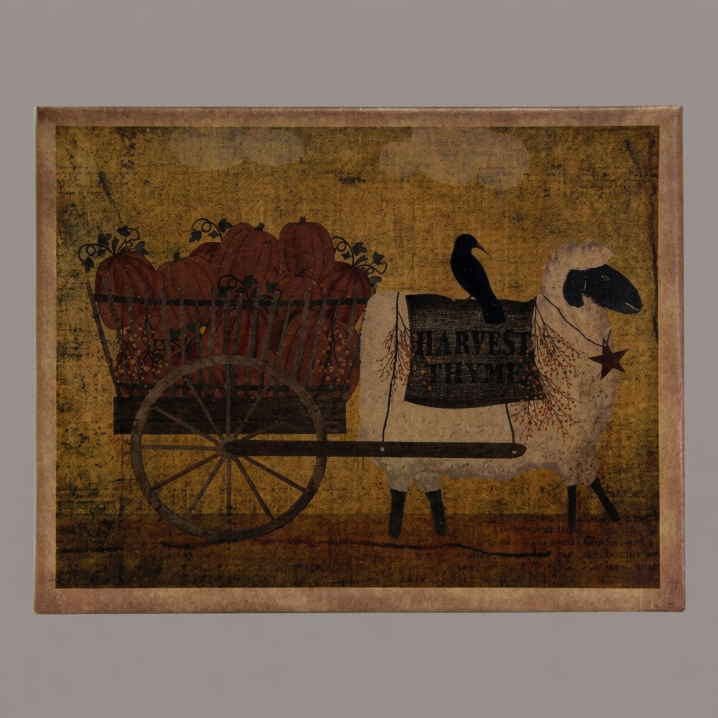Canvas print with a sheep pulling a wagon of pumpkins