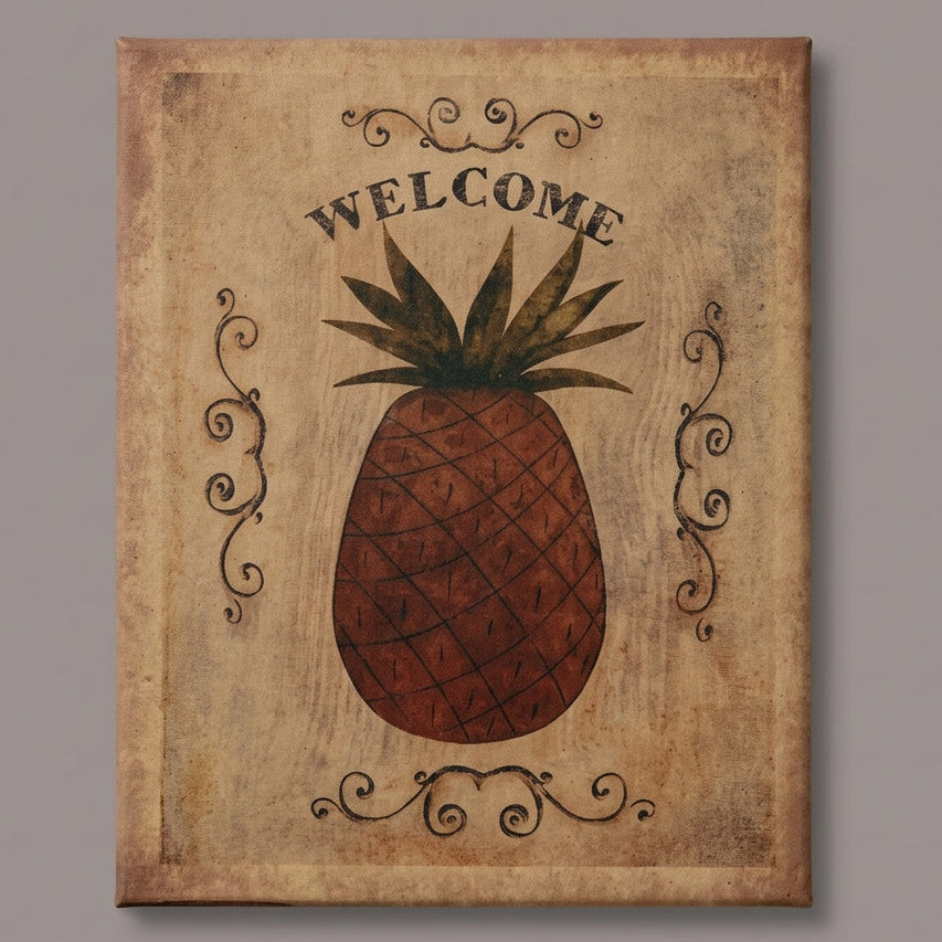 A canvas print featuring a pineapple motif with the word 'Welcome' written above it, set against a gray background.