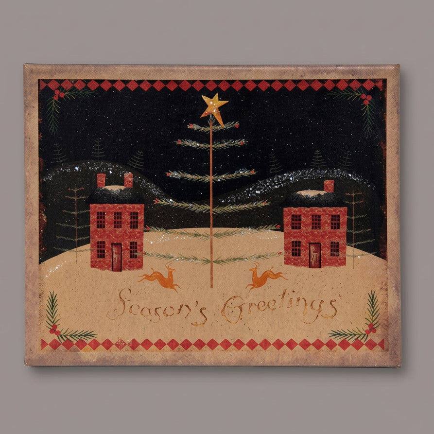 An 8x10 canvas print featuring a winter scene with cabins, a Christmas tree, and holiday greetings.