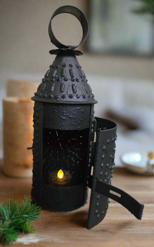 A petite 9-Inch Revere Lantern with a textured black finish, designed for use with a battery operated tea light.