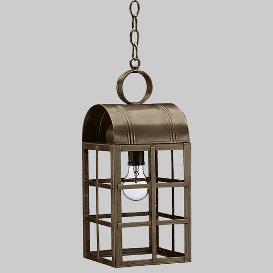 Bronze hanging lantern with a light bulb inside on a gray background