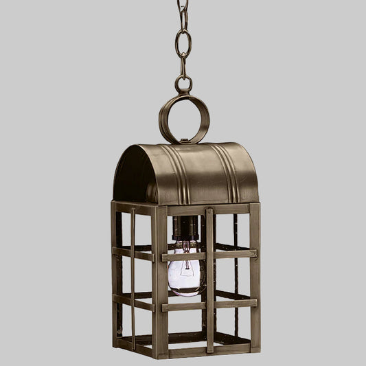Bronze hanging lantern with a clear light bulb on a gray background