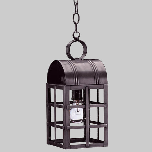 Bronze outdoor hanging lantern with a clear light bulb on a gray background
