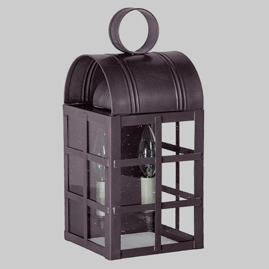 Decorative black lantern with glass panels on a white background