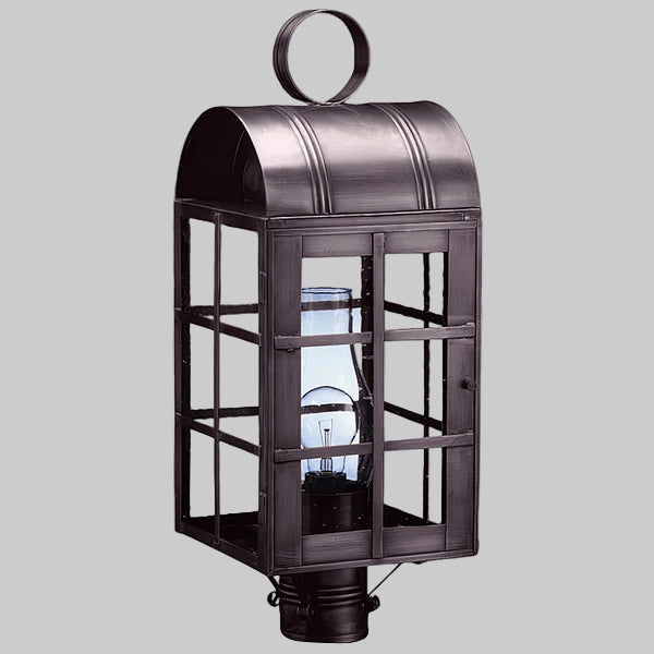 Decorative outdoor lantern with glass panels on a gray background