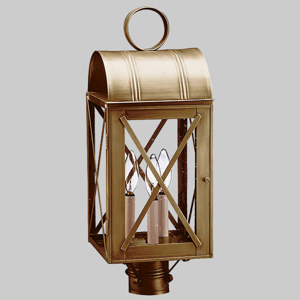 Bronze outdoor lantern with clear glass on a gray background