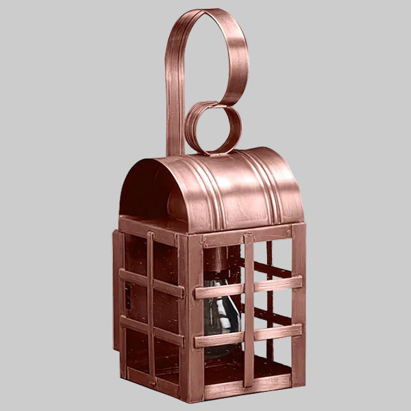 Copper lantern with a handle on a gray background