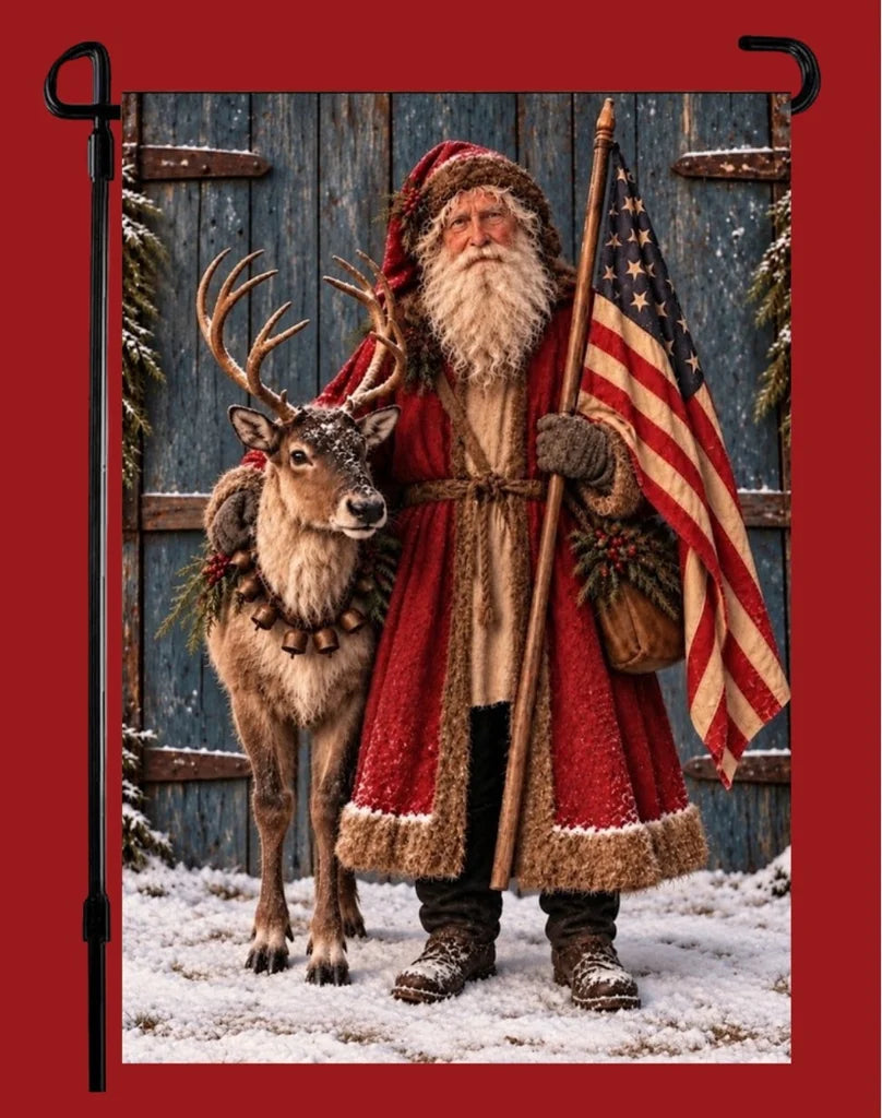Americana garden flag featuring Santa in a red coat holding an American flag beside a reindeer in the snow.⠋