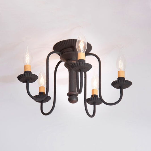 Black chandelier with five candle-style lights on a white background