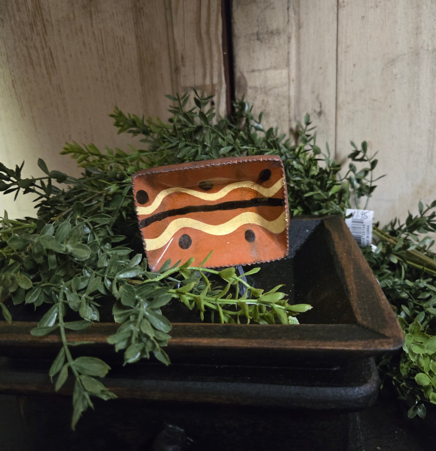 Small rectangular slipware with brown, yellow and black glazing