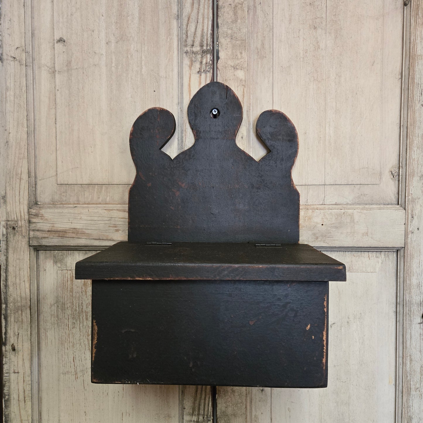 Black wood box on rustic wood background