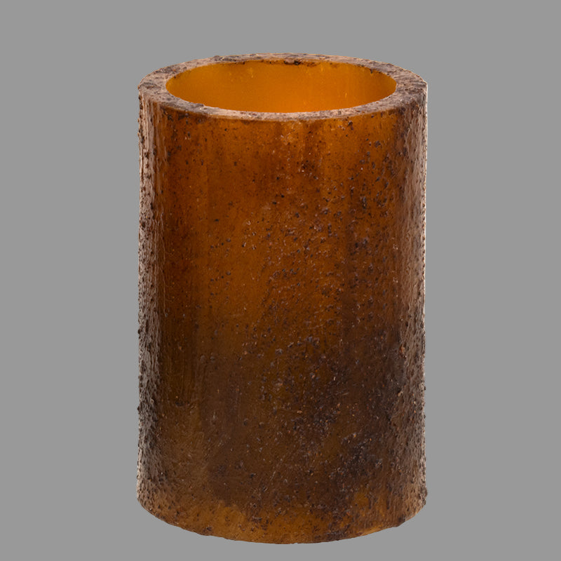 Brown textured cylindrical object on a white background