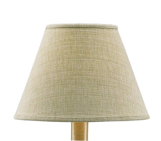 A beige cotton lampshade with a tapered shape, hand-trimmed and sewn, displayed on a stand.