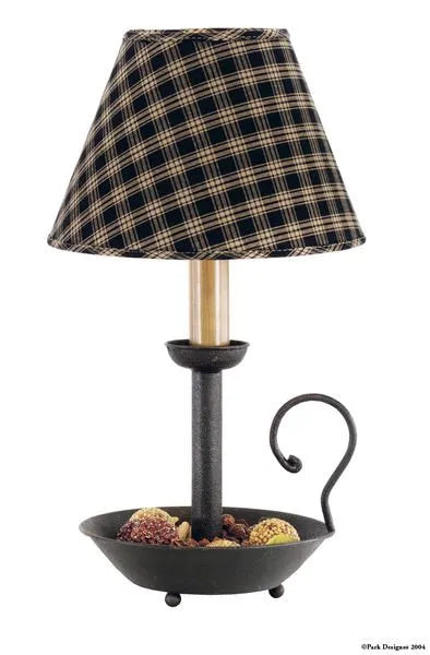 Decorative lamp with plaid shade and metal base on a white background