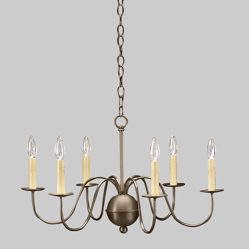 Bronze chandelier with six candle-style lights on a gray background
