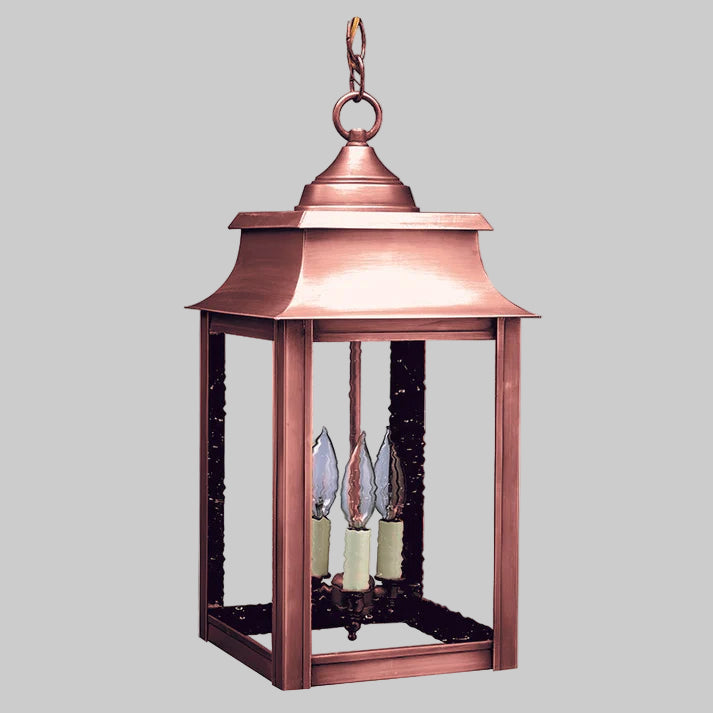 Copper lantern with glass shades on a white background