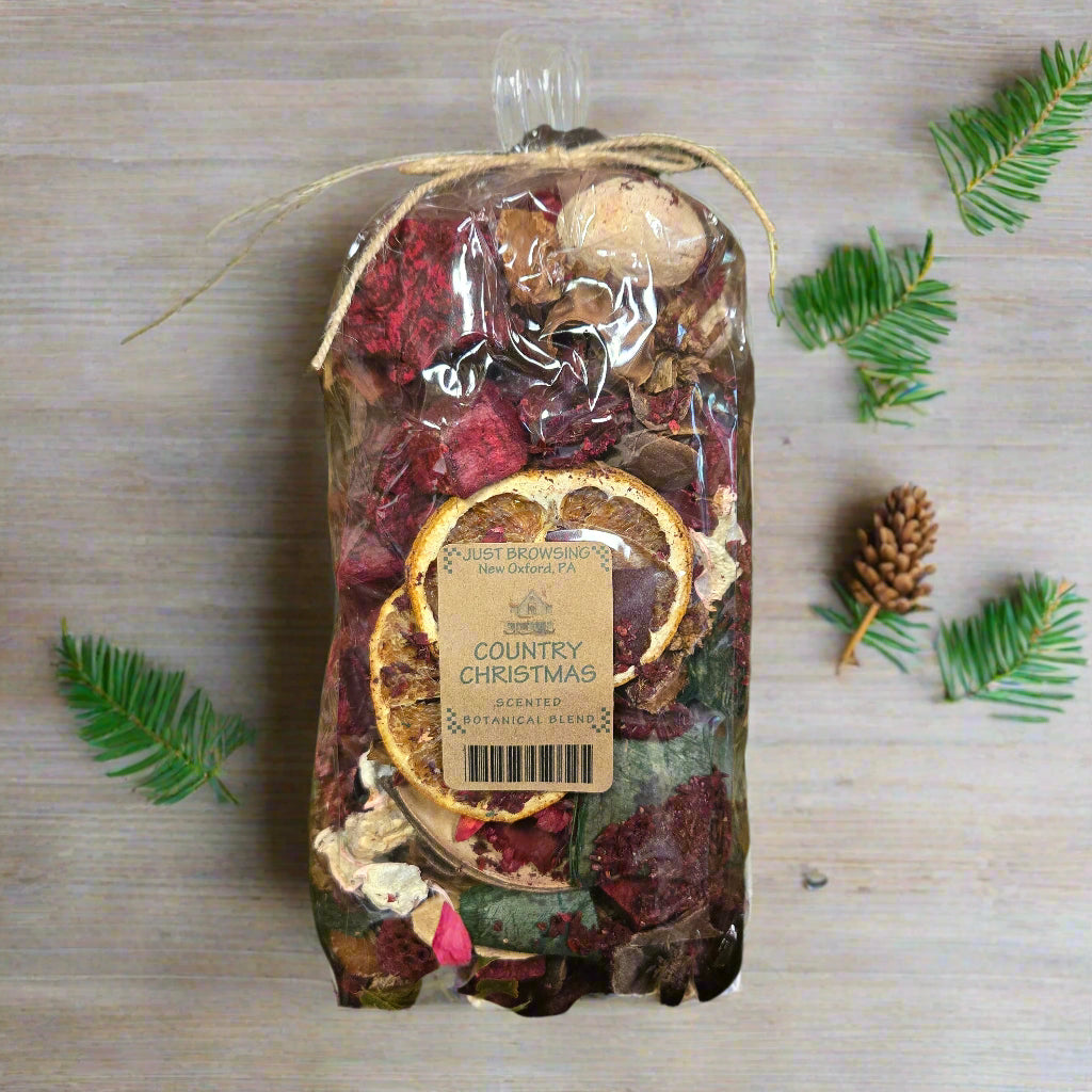 Packaged Country Christmas product on a leafy background