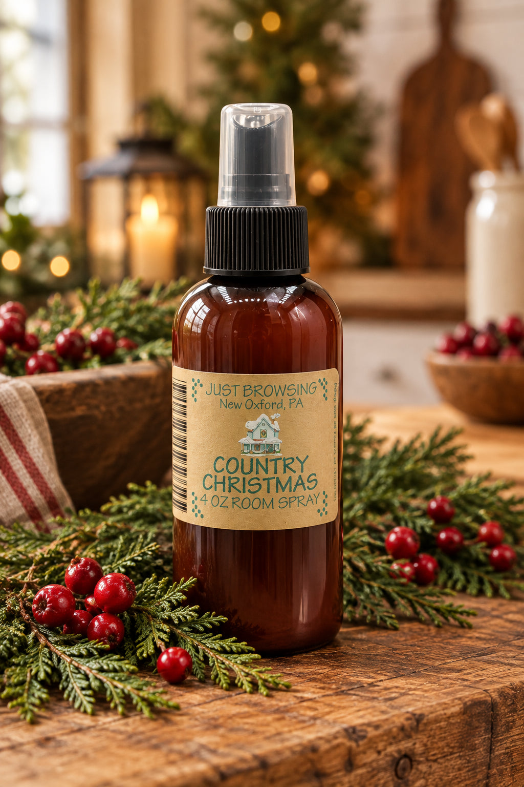 A 4oz bottle of Country Christmas room spray with a mist spray top. The bottle is brown with a label that includes the product name and a Christmas tree graphic.