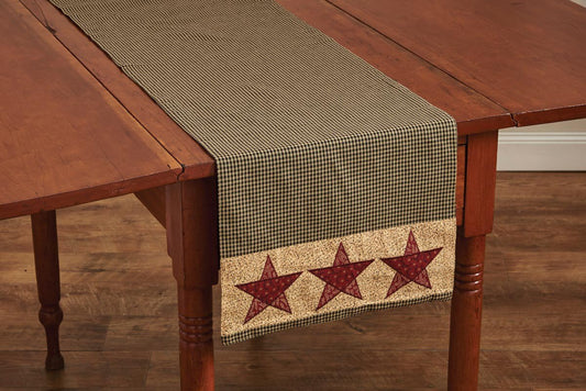 Table runner with star design on a wooden table