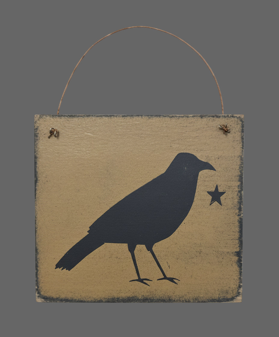 Wooden sign with a bird silhouette and star on a wooden background