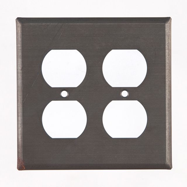 Double outlet cover in tin on white background.