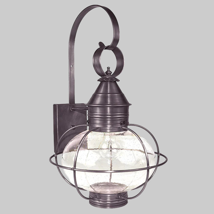 Outdoor wall light fixture with glass shade on a white background