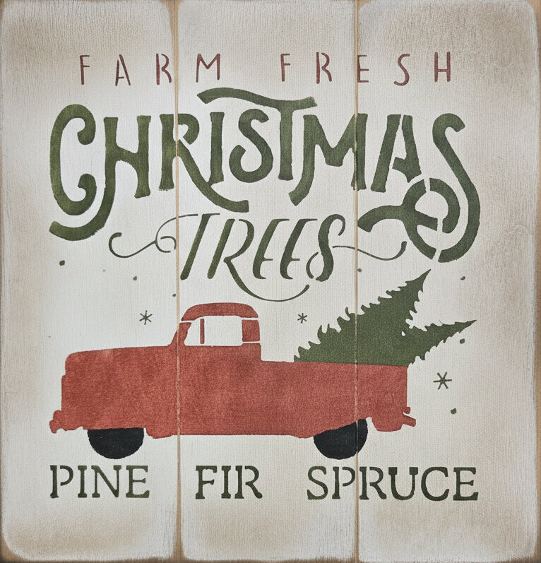 A square sign with a rustic design featuring the text 'Farm Fresh Christmas Trees' and an illustration of a red pickup truck with a Christmas tree in the bed.