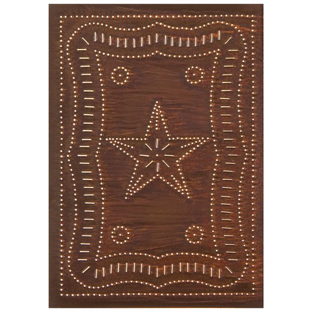 A rustic tin cabinet panel with a vertical federal design, featuring a star in the center and floral patterns around it, pierced with small nails.