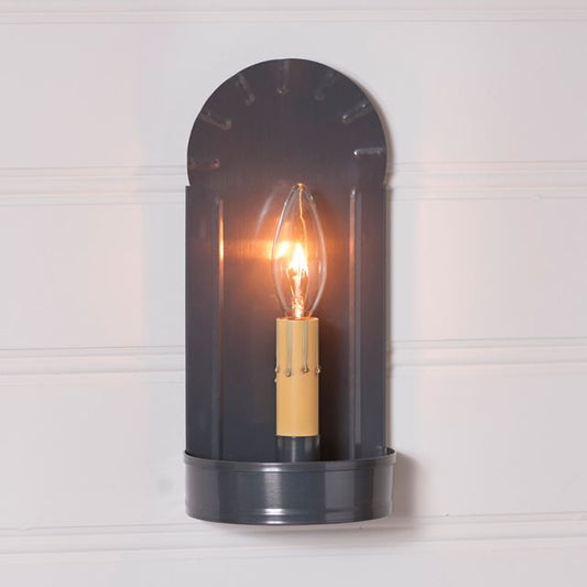 Tin fireplace sconce with one candelabra socket on white background