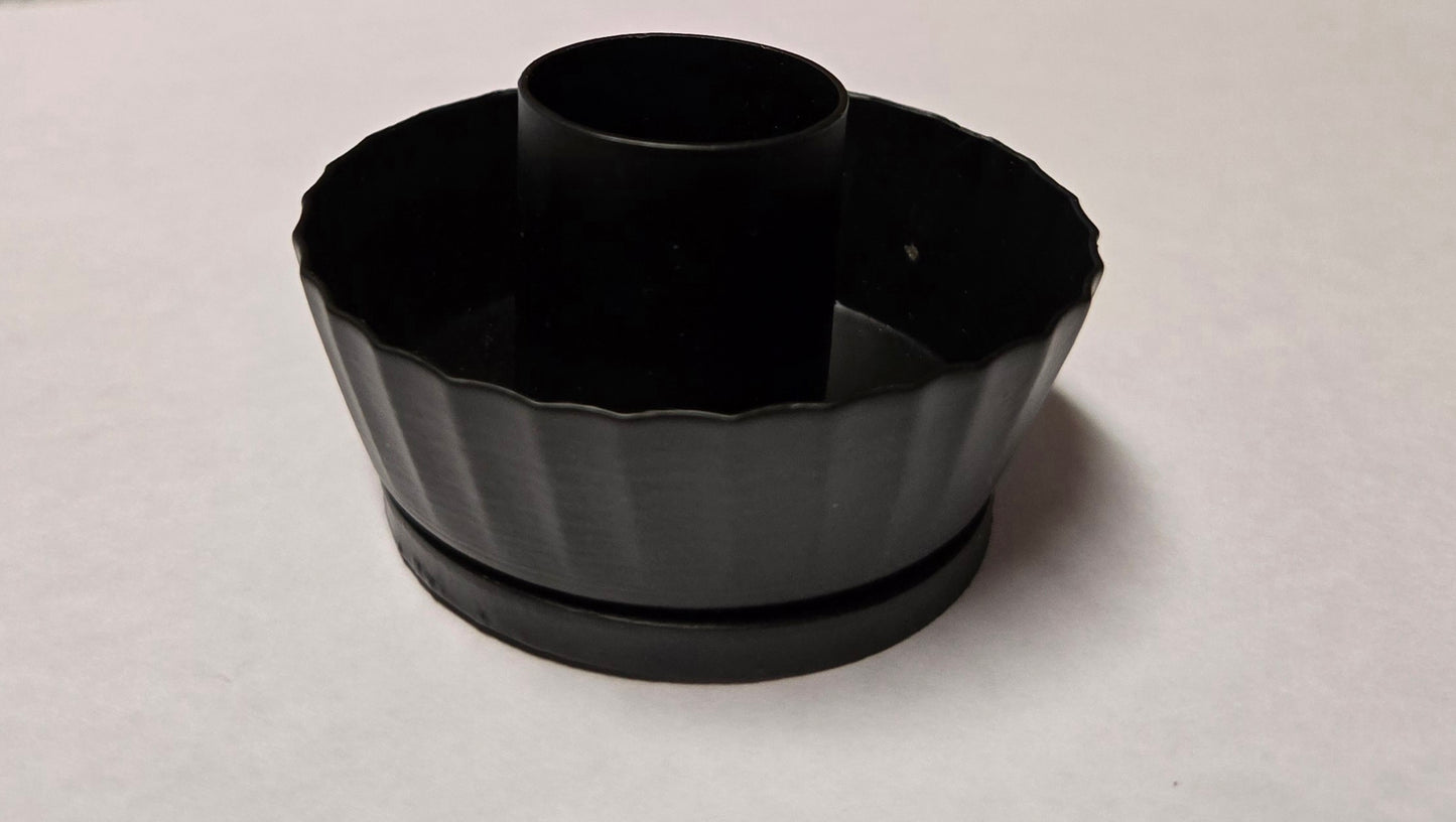 Metal fluted cup with candle holder