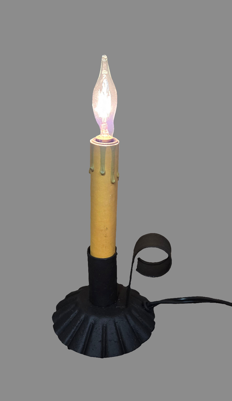 A textured black lamp with a clear glass bulb and a wired electrical cord.