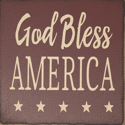 Wooden sign with 'God Bless America' text on a gray background