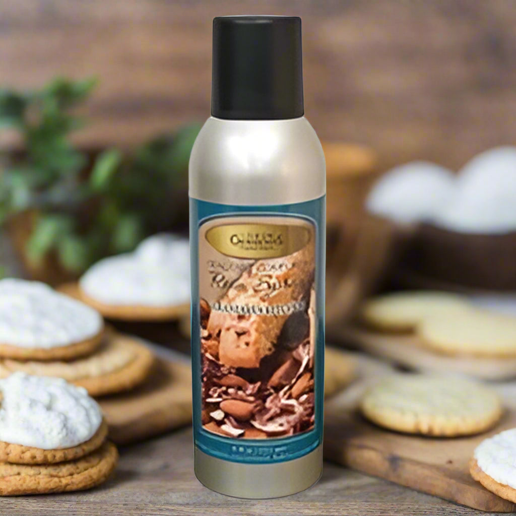 A can of Grandma's Kitchen Room Spray with a label that includes an image of cookies and the scents listed on the label.