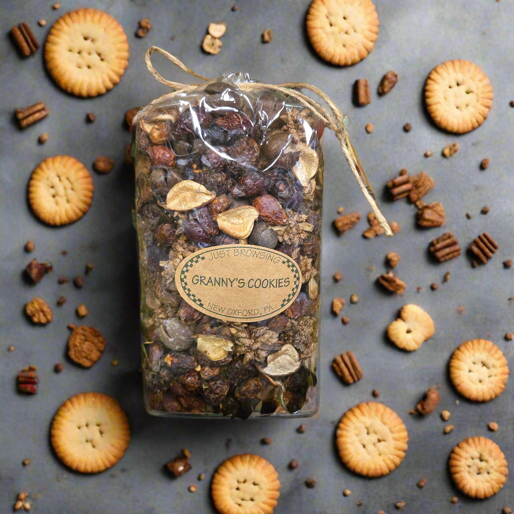 Bag of potpourri surrounded by cookies and spices