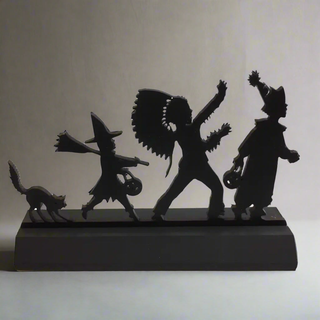 Black silhouette of characters on a white background