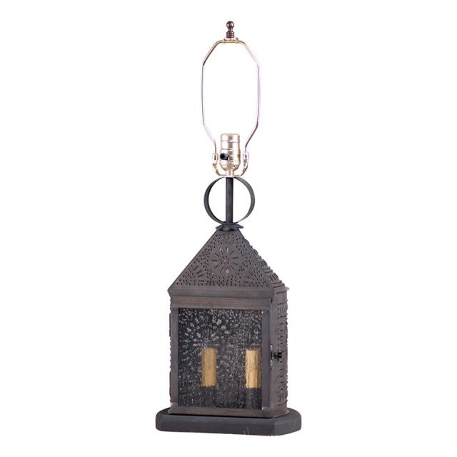 Tin lamp base that holds two candelabra bulbs inside and standard bulb on top with piercing on white background.