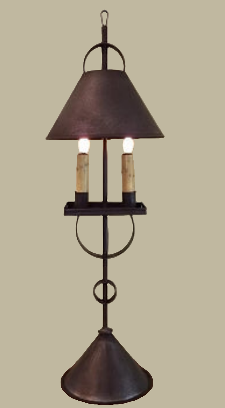 A dark brown tin table lamp with a conical shade, featuring two candle-like light bulbs.