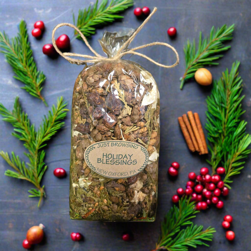 Herbal mix in a clear bag with a label on a green leafy background