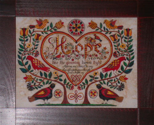 Framed print of a reproduction fraktur with the theme of hope with birds, flowers, and a heart